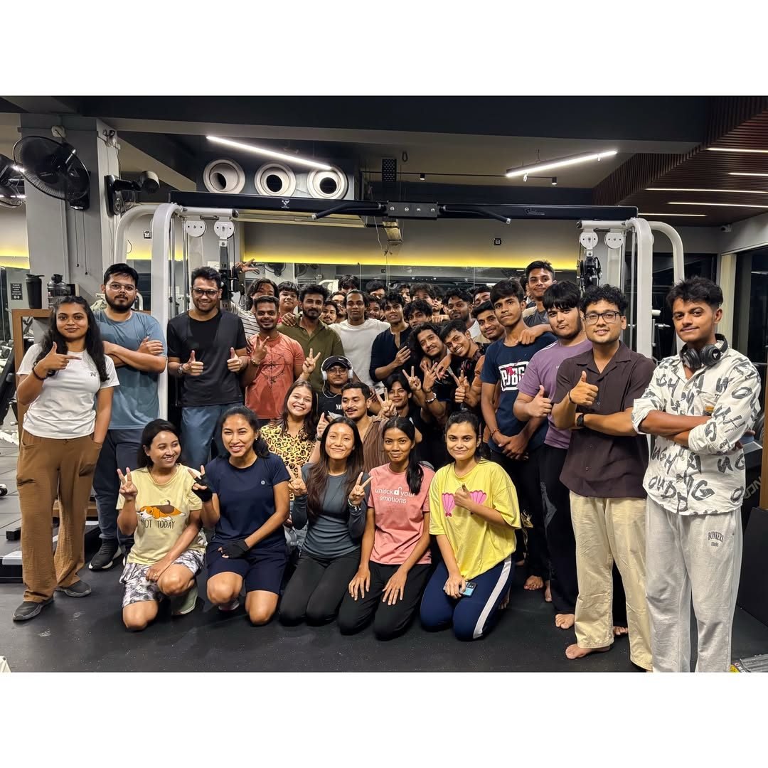 The Muscle Mansion community celebrating the gym's anniversary