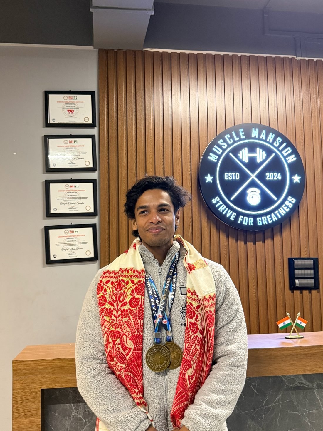 Akash Basak with his Mr. Assam gold medal