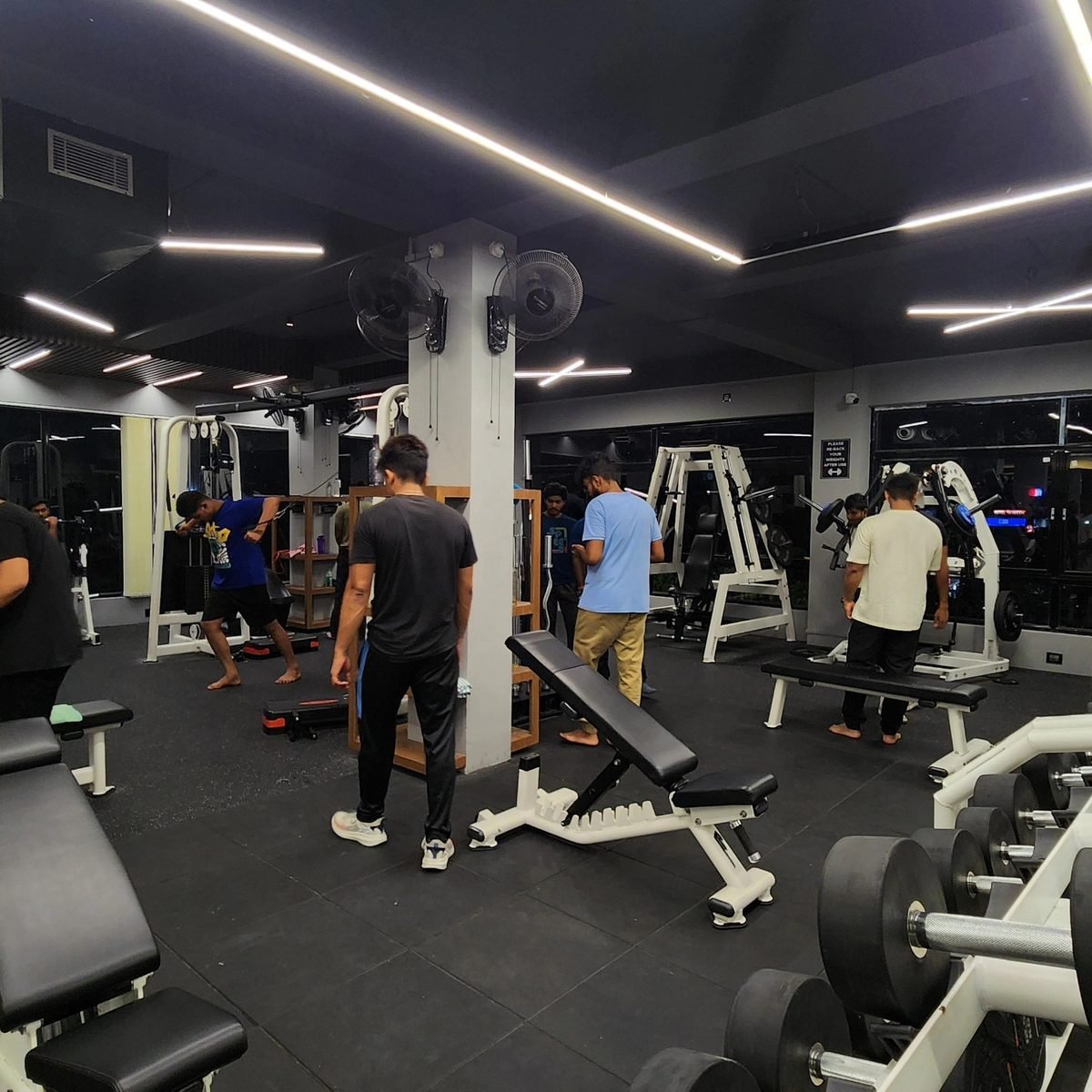 Strength machines on the Muscle Mansion training floor