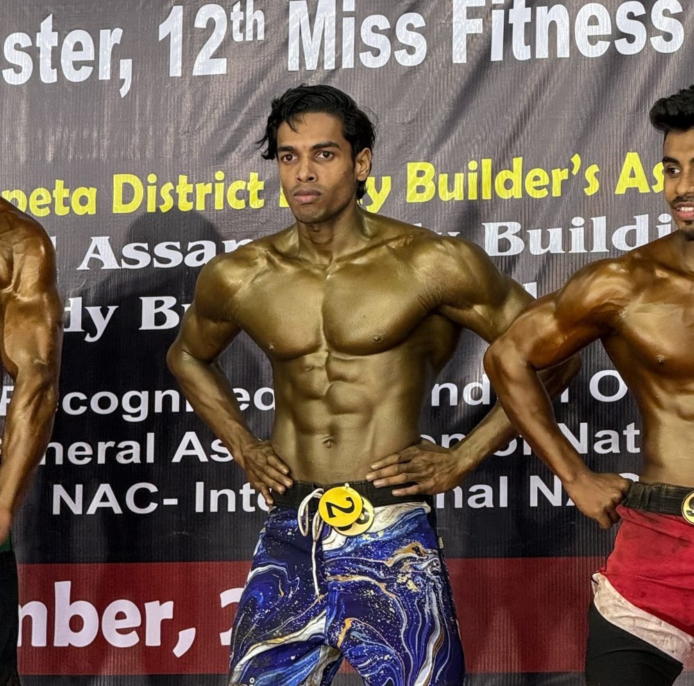 On stage at the Mr. Assam championship